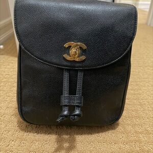 CHANEL Black Caviar Leather Drawstring Backpack with Gold CC